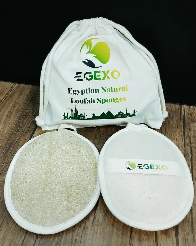 EGEXO printed cotton bag with two oval loofah pads, one with a sewn EGEXO label band