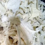 Close-up of loofah scrap fibres, natural shredded loofah