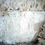 Single compressed bale of shredded loofah scrap